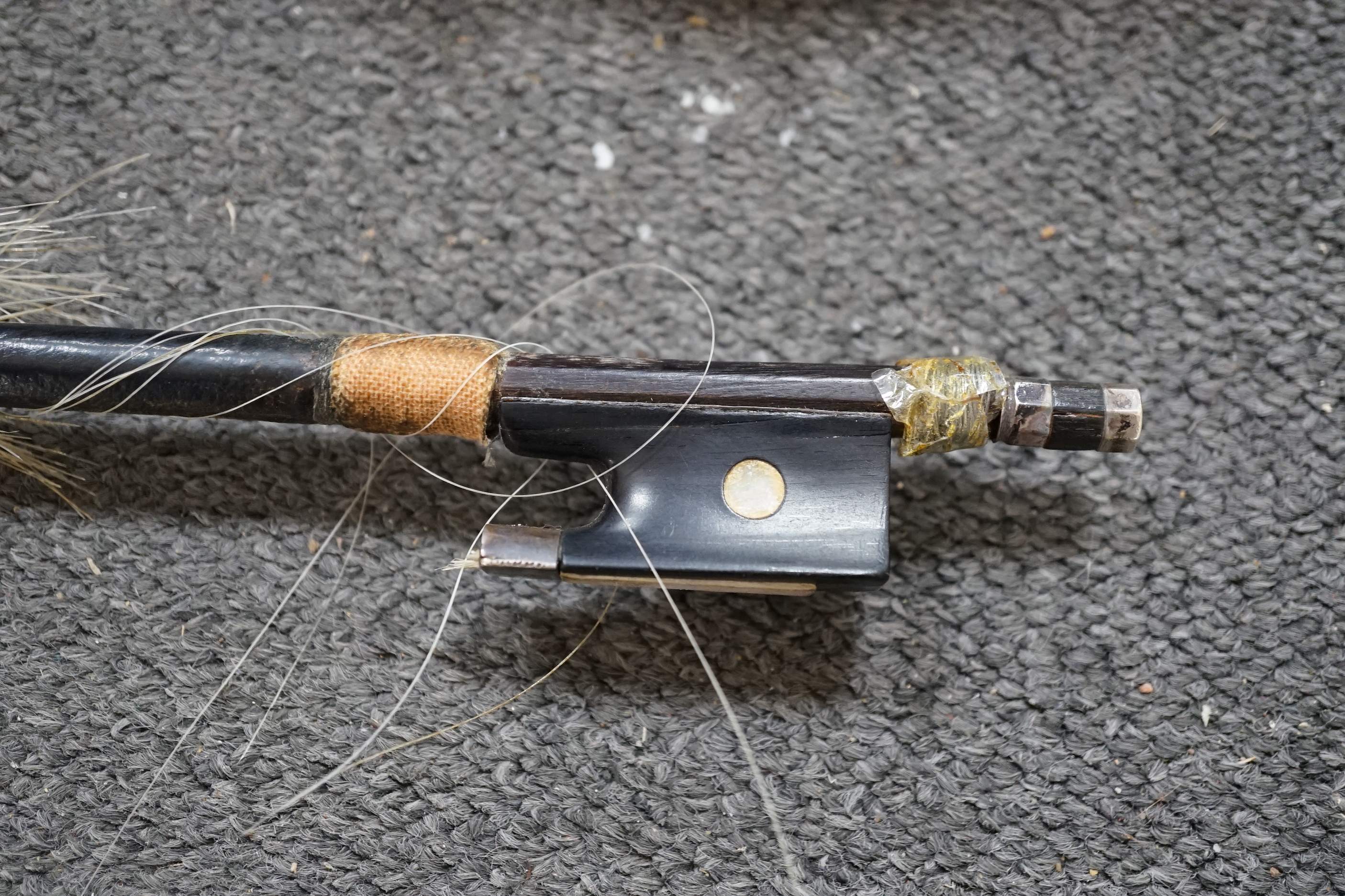 A 19th century violin with silver mounted bow and case, back measures 36cm CITES Submission reference JX7RJU7S